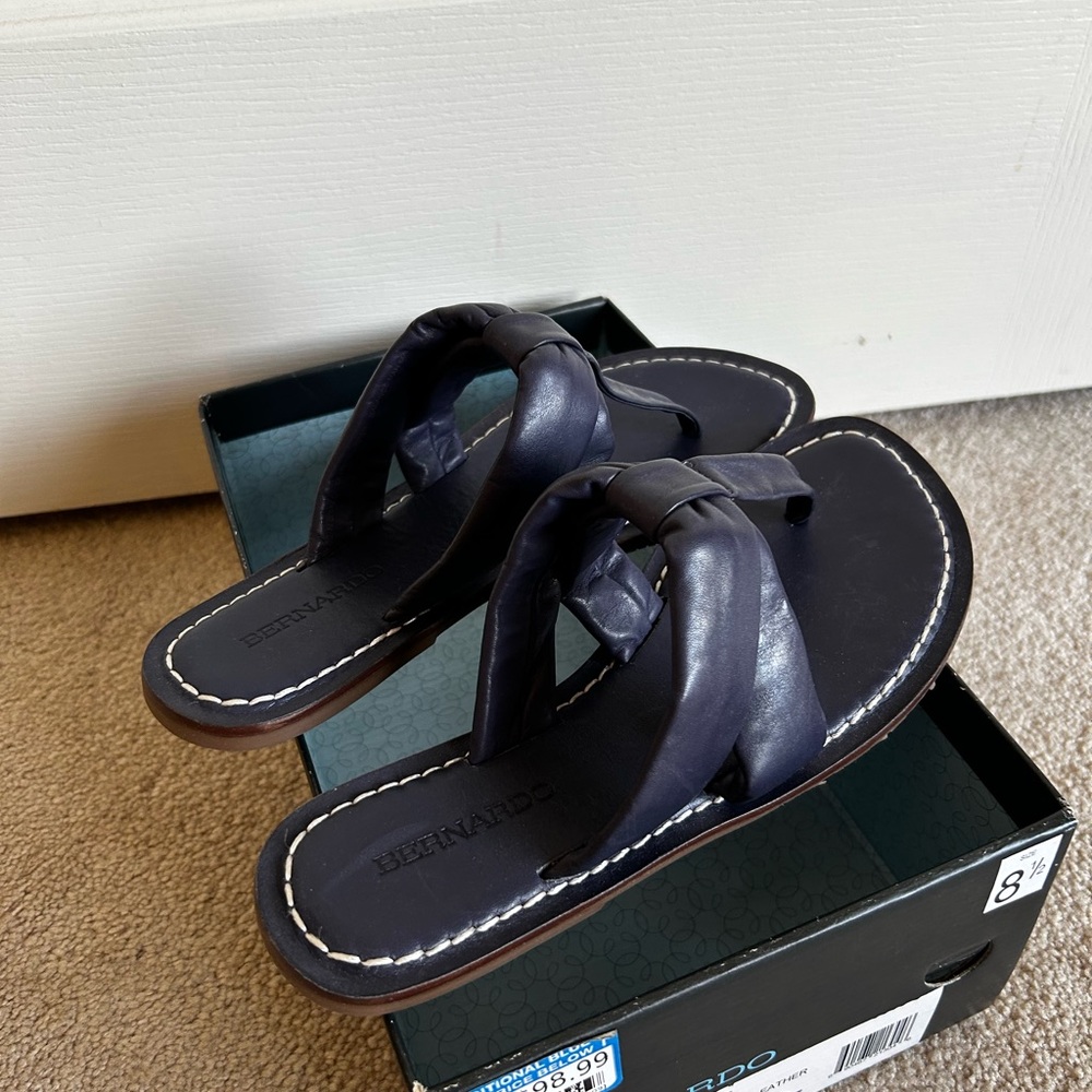 Bernardo Glove Leather slip-on thong sandal in Midnight.